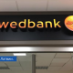 Swedbank в сентябре увеличит цены на свои услуги в Латвии.
