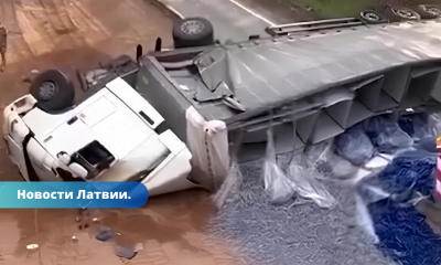 FOTO. Traģisks negadījums uz šosejas Rīga-Sigulda: kravas automašīnu sadursmē gājis bojā vadītājs.