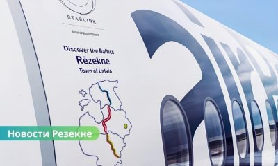 Самолет airBaltic теперь носит имя Резекне город Латгалии представляют в небе по всему миру.
