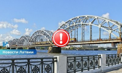 Трагедия в Риге: найден сотрудник железной дороги, упавший с Железнодорожного моста в Даугаву.